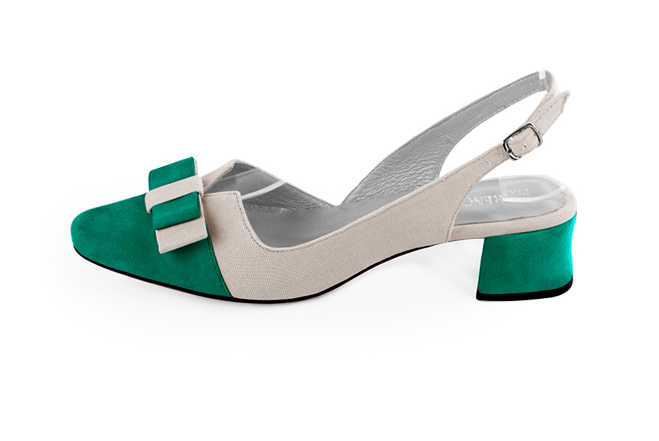 French elegance and refinement for these emerald green and light silver dress slingback shoes, with a knot, 
                available in many subtle leather and colour combinations. The pretty French spirit of this beautiful pump will accompany your steps nicely and comfortably.
To be personalized or not, with your materials and colors.  
                Matching clutches for parties, ceremonies and weddings.   
                You can customize these shoes to perfectly match your tastes or needs, and have a unique model.  
                Choice of leathers, colours, knots and heels. 
                Wide range of materials and shades carefully chosen.  
                Rich collection of flat, low, mid and high heels.  
                Small and large shoe sizes - Florence KOOIJMAN
